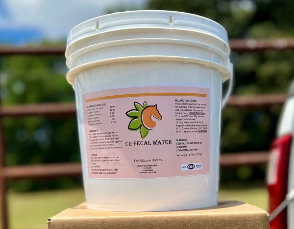 bucket of C2 Fecal Water supplement with label treats free fecal water syndrome in horses